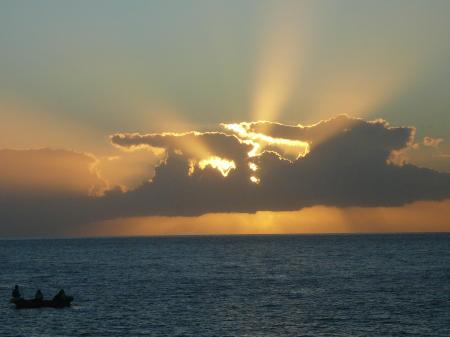 Coucher de soleil sur des pecheurs